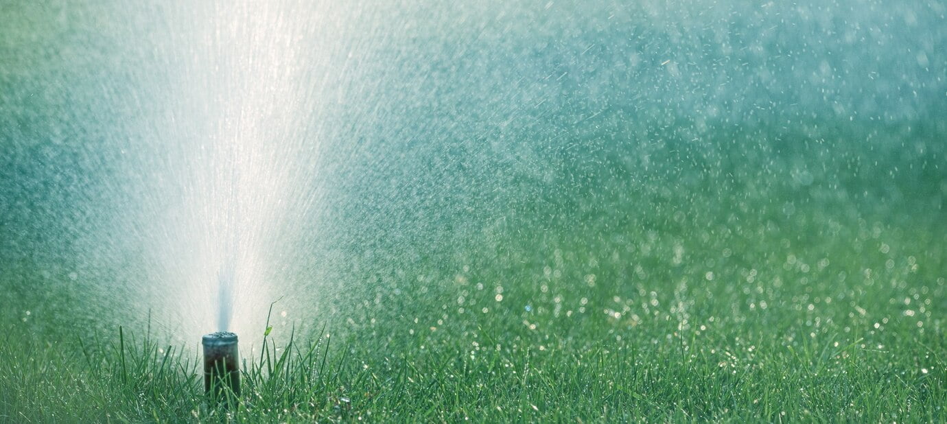 the-automatic-watering-system-irrigates-lawn-grass_160152-1303